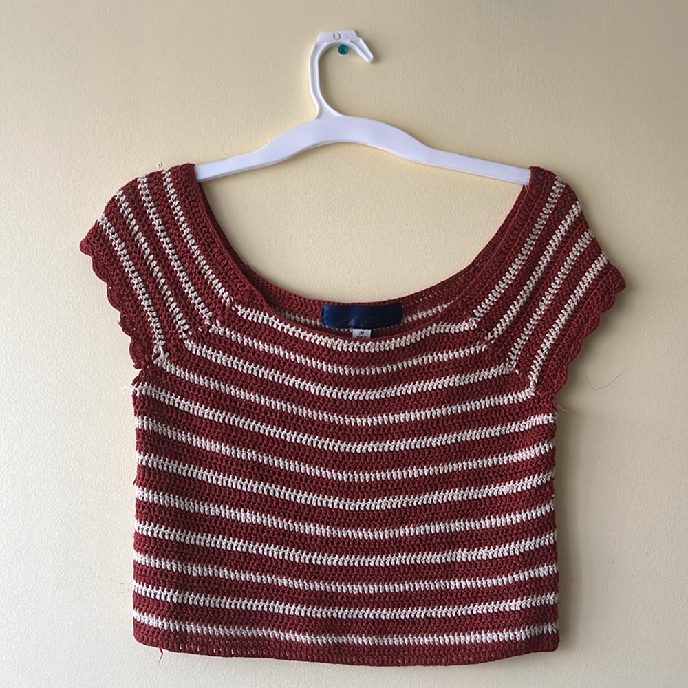 Orange and white striped knit top